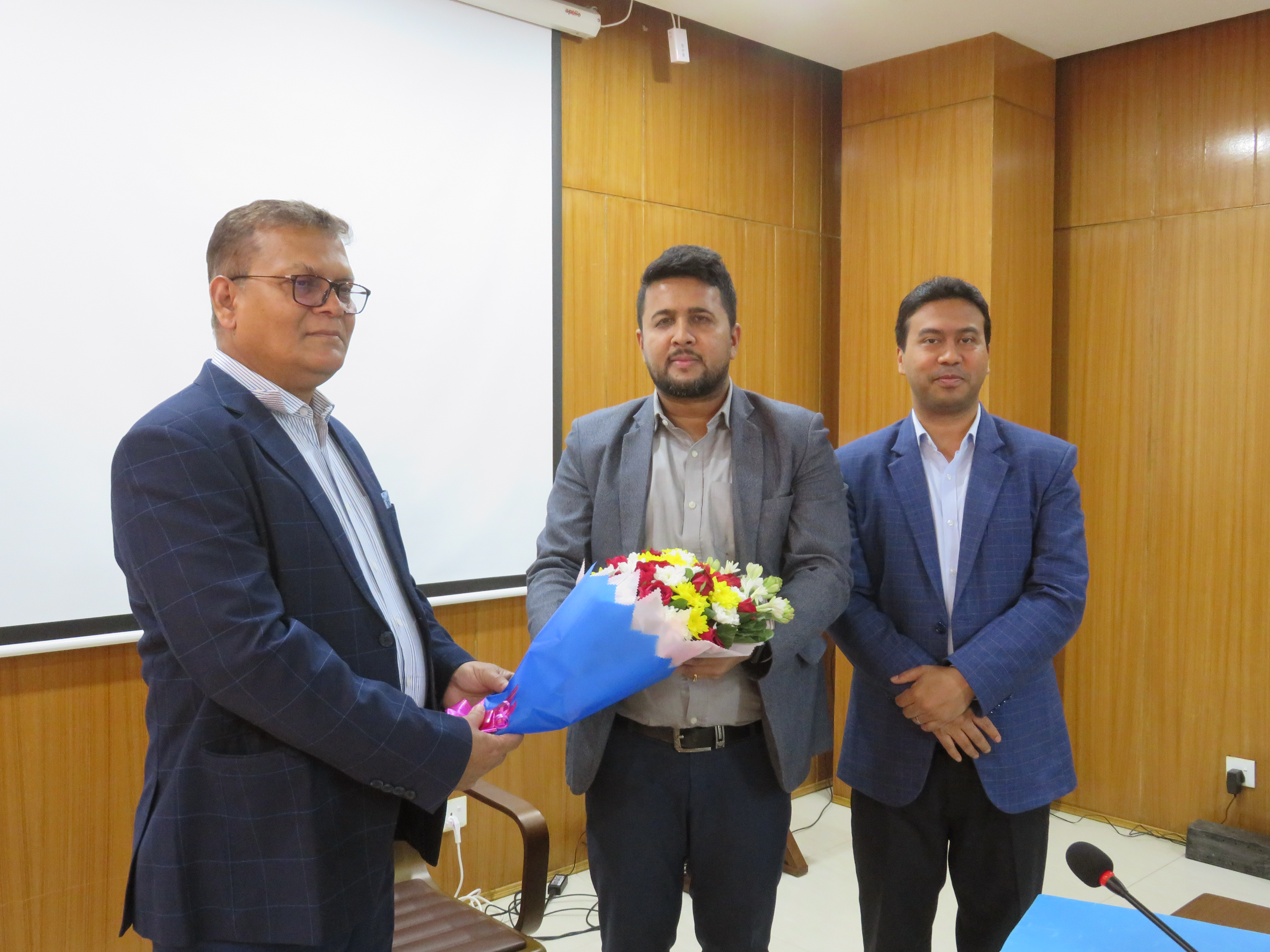 The Honorable Director General welcomed the newly appointed Deputy Director Mr. Md. Jenith Alom Mia with a bouquet of flowers.